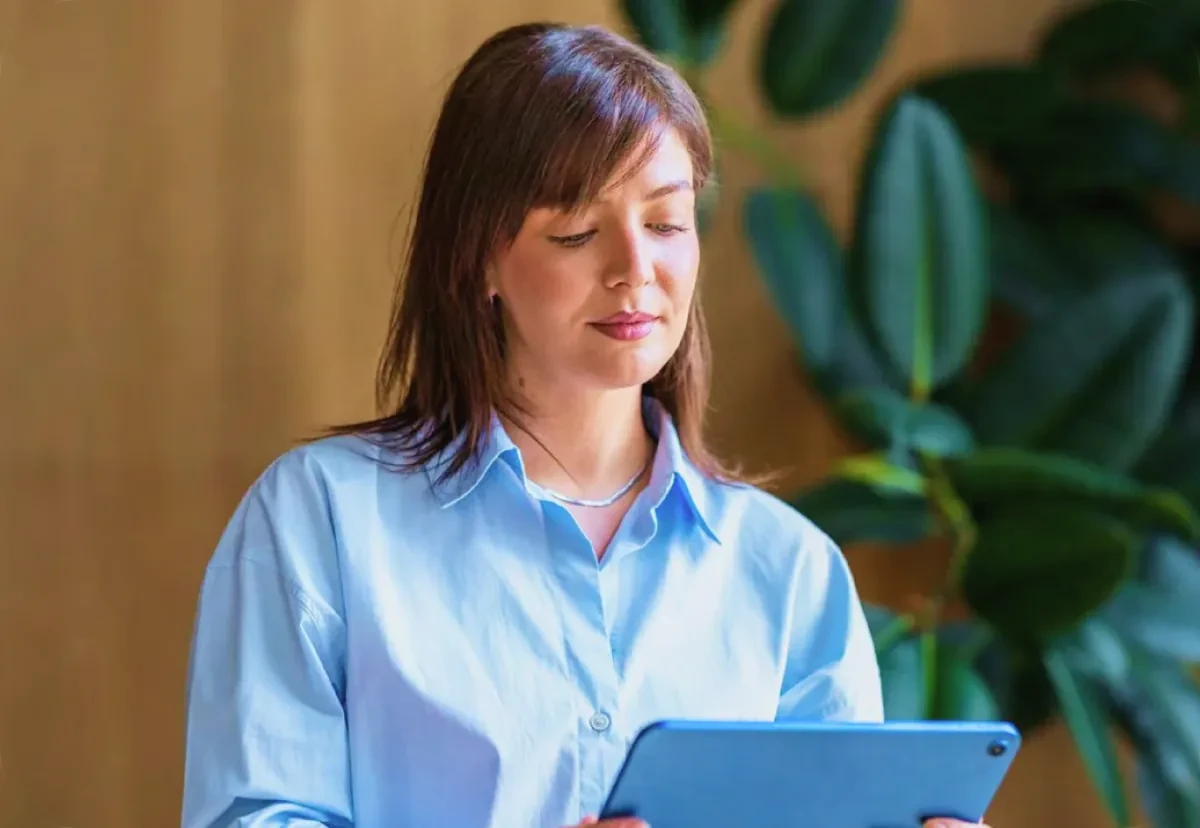A solicitor reviewing a new enquiry on a tablet